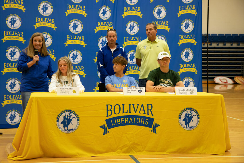 Front row, left to right: Sidney Batten, Jacob D'Agostino, and Evan Hendrickson. Back row: Vicki McDonald, track and field coach; Steve Fast, soccer coach; and Daniel Bayless, track and field coach.