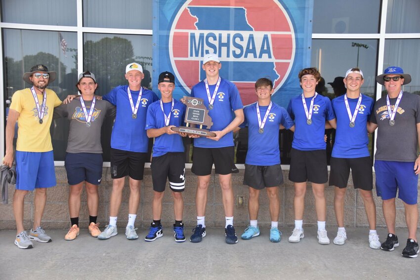 The Bolivar Liberators hold their Class One State Runner-Up trophy.   From left to right: Royce Bryan, Cooper Bethel, Brodie Campbell, Emery Havens, Kyle Pock, Seth Martin, Cy Douglas, Ben Tull, and Nathan Rothdiener.   STAFF PHOTO/AIDAN MAUCK