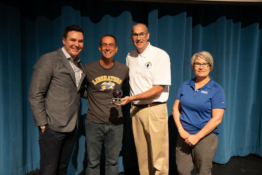 Jeff Edge is awarded the 2023 Master Teacher of the Year for the Bolivar R-1 School District. Pictured (from left to right): Jared Taylor (OakStar Bank), Jeff Edge (ECLC special education teacher), Dr. Richard Asbill (superintendent), Dr. T.C. Wall (assistant superintendent).