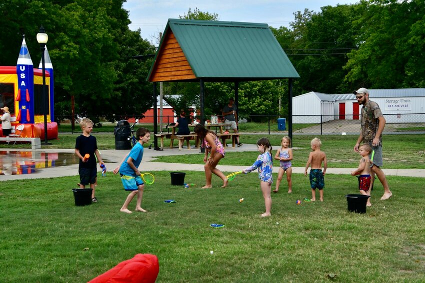 Kids took advantage of the summer weather to play outdoor water games at the Cribbs Family Youth Park during Polk County Library's Wet 'n Wild event.