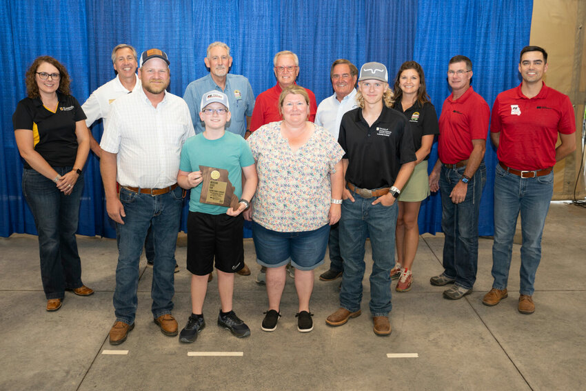 Pictured with the Schuber family: Sarah Traub, Interim Associate Vice Chancellor for MU Extension &amp;amp; Director of Education &amp;amp; Impact, Chris Daubert, MU Vice Chancellor &amp;amp; Dean, College of Agriculture, Food and Natural Resources, Kevin Roberts, Chairman, Missouri State Fair Commissioner, Jerald Andrews, Missouri State Fair Commissioner, Randy Little, Missouri State Fair Commissioner, Jamie Johansen, Missouri State Fair Commissioner, Todd Hayes, Vice President, Missouri Farm Bureau, Blake Rollins, Chief Administrative Officer, Missouri Farm Bureau.   CONTRIBUTED PHOTO