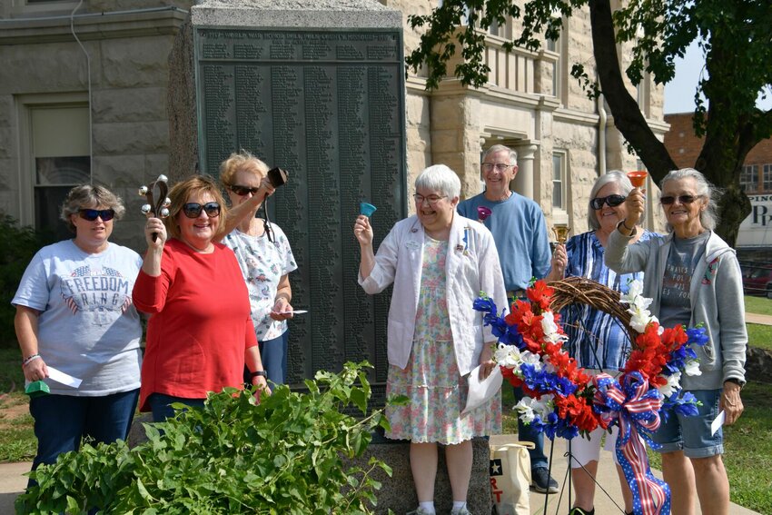 Pictured left to right: Audra Flett, Tam Daughtrey, Anne.Keller, Jennifer Smith, Bill Keller, Leta Gass and Nancy Nickels. Not pictured; Leta Flett and Charles Flett participated in the bell ringing from their car.   STAFF PHOTO/LINDA SIMMONS