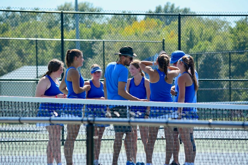 Excitement, exhaustion, and relief fills the team after their matches.   STAFF PHOTO/CALEB HOLCOMB
