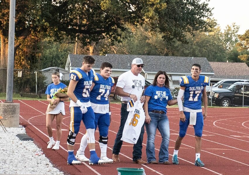 The Bolivar Liberator football team had senior night on Friday, Sept. 29. The parents of Cash Cable were presented with a team jersey in memory of their son.   STAFF PHOTO/BOB CAMPBELL