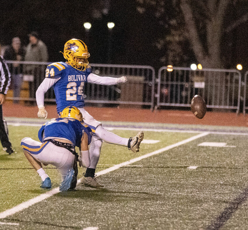 #24 Seth Martin scores an extra point in the game on Friday, Nov. 10.   STAFF PHOTO/BOB CAMPBELL
