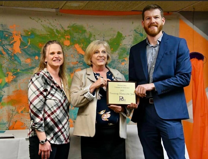 From left to right: 2023 Community Partner of the Year Polk County Library representatives Laura Jenkins and Colleen Knight, with Chamber President Jacob Wilson.   CONTRIBUTED PHOTO