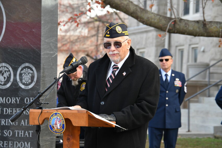 Mike Hughes with the DAV Chapter 66 brought a message and stressed that &ldquo;not only should we thank a Veteran but we should listen to them.&rdquo;   STAFF PHOTO/LINDA SIMMONS