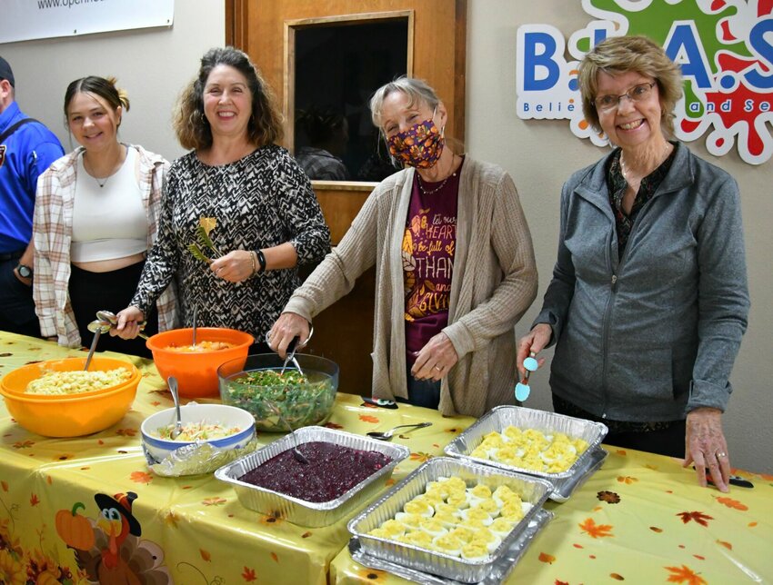 Thankful to be involved with the dinner from the left to the right; Hannah Watkins, Jennie Dunaway, Linda Marshall and Claudia Lower.   STAFF PHOTO/LINDA SIMMONS