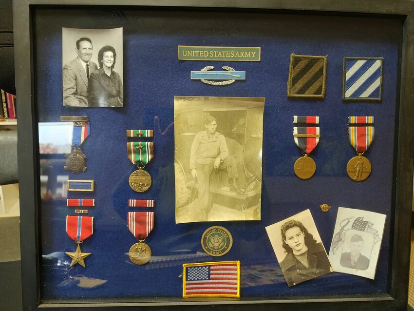 Pool's Medals and wartime photographs. The medals are: Bronze Star; Good Conduct Medal; Presidential Unit Citation; European-African Middle Eastern Campaign Medal and Bronze Star Attachment; World War II Victory Medal; Army of Occupation Medal and Germany Clasp; Combat Infantryman Badge 1st Award; Honorable Service Lapel Button WWII