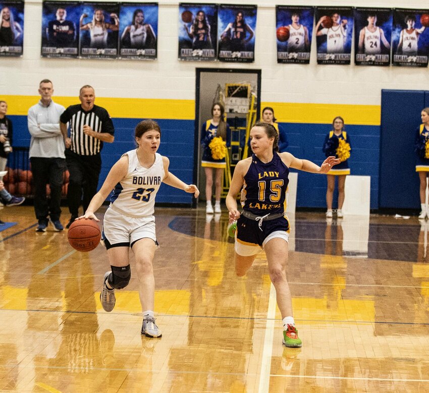 #23 Carly Cribbs being chased by the Lady Lakers pressure defense.   STAFF PHOTO/BOB CAMPBELL