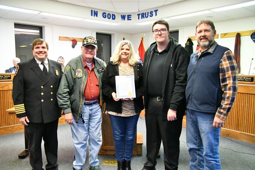 Pictured from left to right: Fire Chief Brent Watkins, Rhodes' grandfather Roman Kolody, Kristi Thomson, Anakin Rhodes, and Mayor Chris Warwick&nbsp;