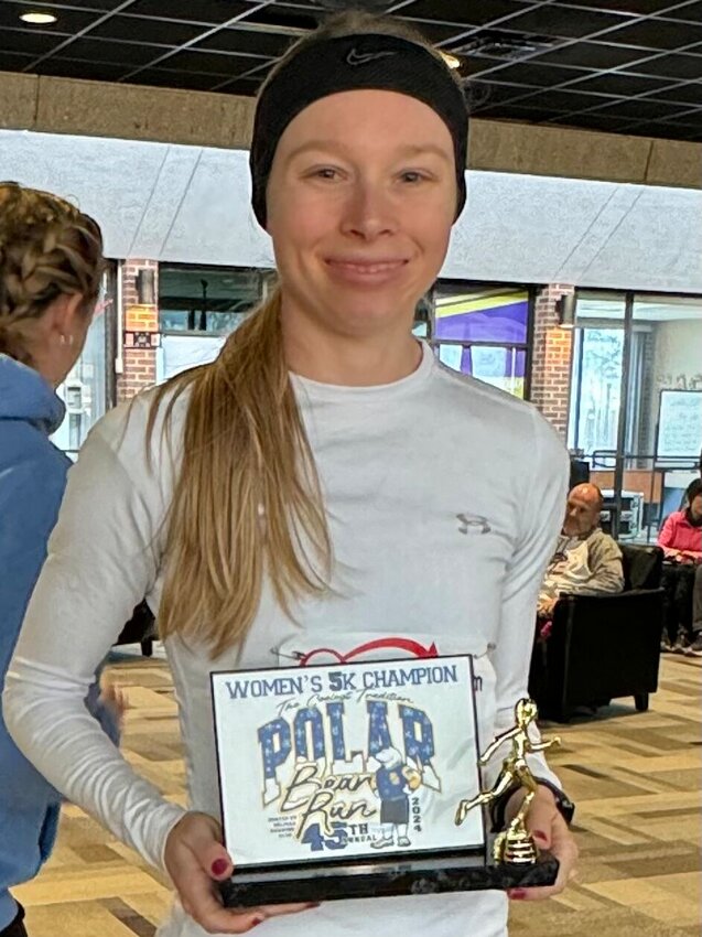 Alicia Englebrecht took home the trophy for top overall 5k female runner in Saturday&rsquo;s 45th Polar Bear Run.   CONTRIBUTED PHOTO