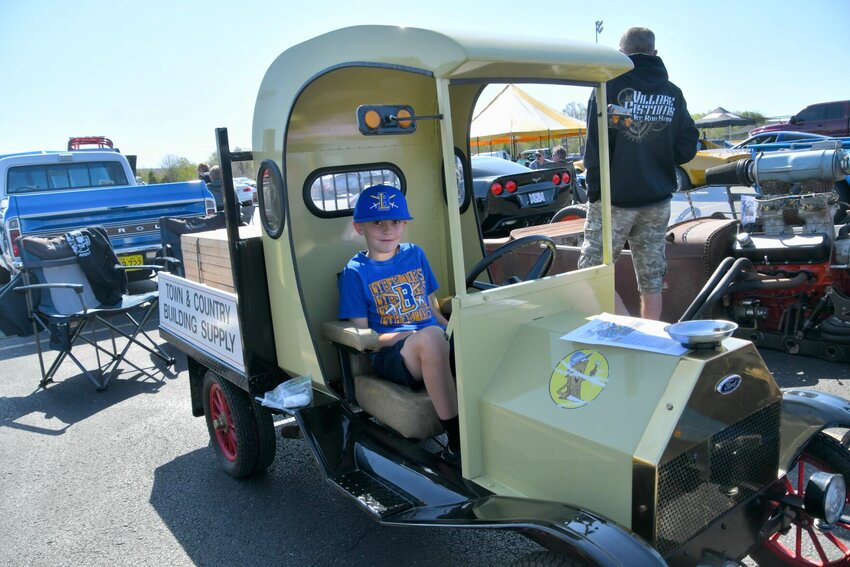 Saturday, April 13 was the perfect day for being outside and enjoying the BOMO Car Show at Bolivar High School. Gunner Degraffenreid enjoyed showing off &ldquo;Woody,&rdquo; his unique vehicle given to him by the family of the late Dorothy Isdell.   STAFF PHOTO/LINDA SIMMONS