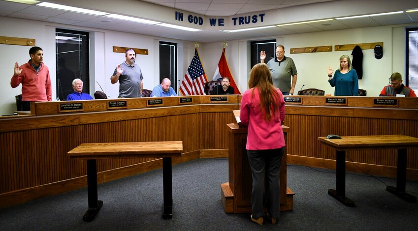 Aldermen are sworn in during the April 11 meeting. 