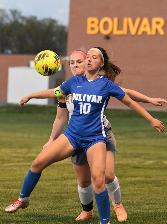 Senior forward Claire Giglio works to keep position on her defender before settling the ball for an attack.