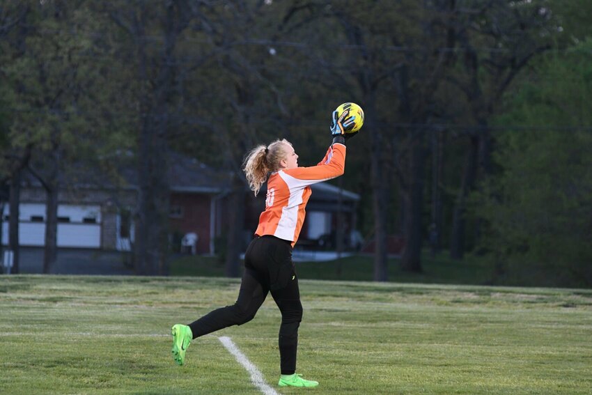 Sophomore keeper Aby Kaufmann makes another save in goal for the Lady Liberators.   STAFF PHOTOS/ANNIE THOMAS