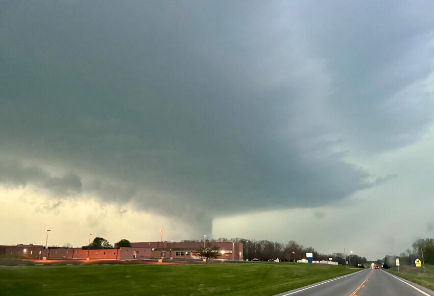 What looks more like a funnel cloud passing over Bolivar, on April 1, actually was hail leaving its mark on a lot of peoples cars and roofs. Contributed photo Rick Davis.
