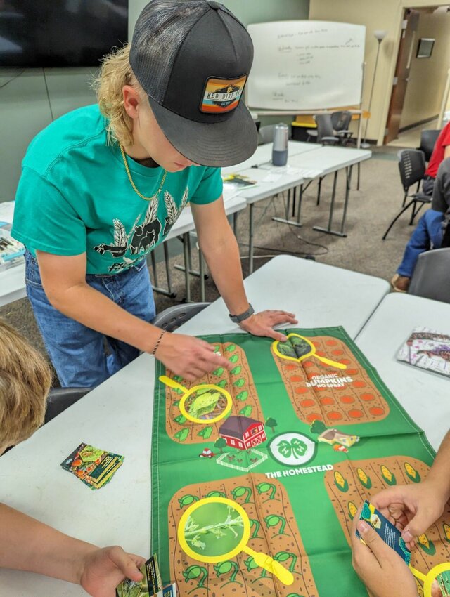 Jackson Schuber is shown teaching the &ldquo;crop damage&rdquo; lesson to the students at the Good Samaritan Boys Ranch.   CONTRIBUTED PHOTO