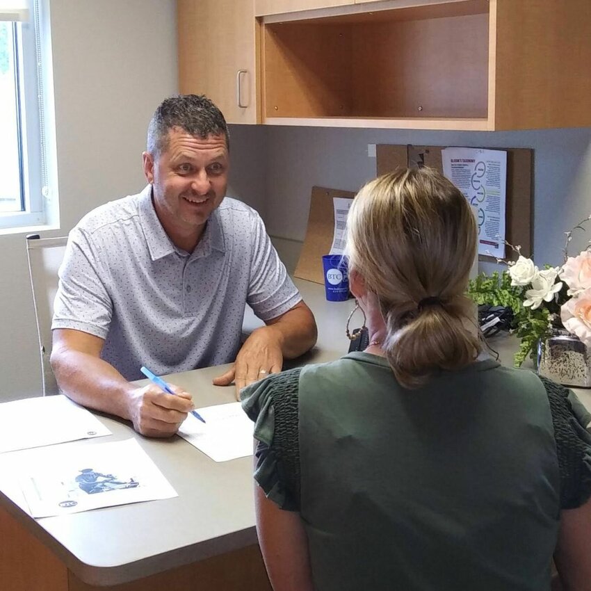 Bolivar Technical College Admissions representative, Daniel Leith, meets with potential LPN student to discuss the new 16 month option available.