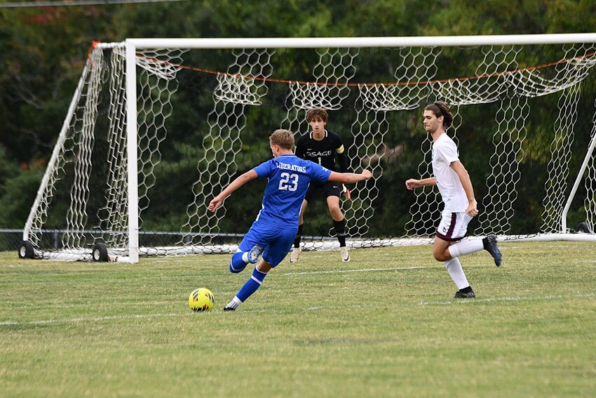 Junior Matt Giglio eyes the net early in the game with the Liberators dominating possession throughout the match.


STAFF PHOTOS/ANNIE THOMAS