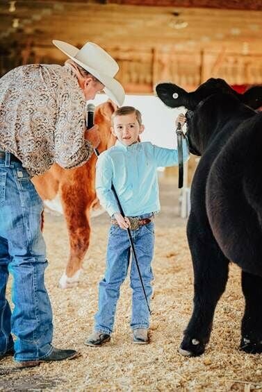 Junior exhibitor Maverick Crawford talking with judge Jason Beltz during the PeeWee Showmanship division.   CONTRIBUTED PHOTO