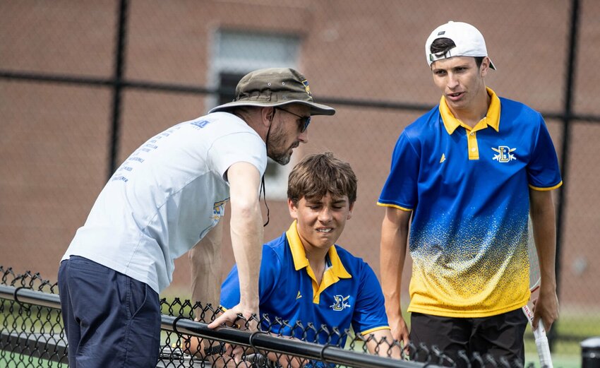 Coach Royce Bryan imparts some wisdom to Colton Ingold and Mac Rich.


STAFF PHOTO/BOB CAMPBELL