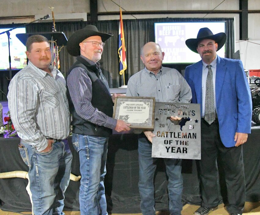 Tygart accepts Cattleman of the Year award. Pictured left to right: Polk County Cattleman Association Vice President Jody Wing, President Ed Vest, Clark Tygart, Missouri Beef Days Board President Matt Henenberg.   STAFF PHOTO/LINDA SIMMONS