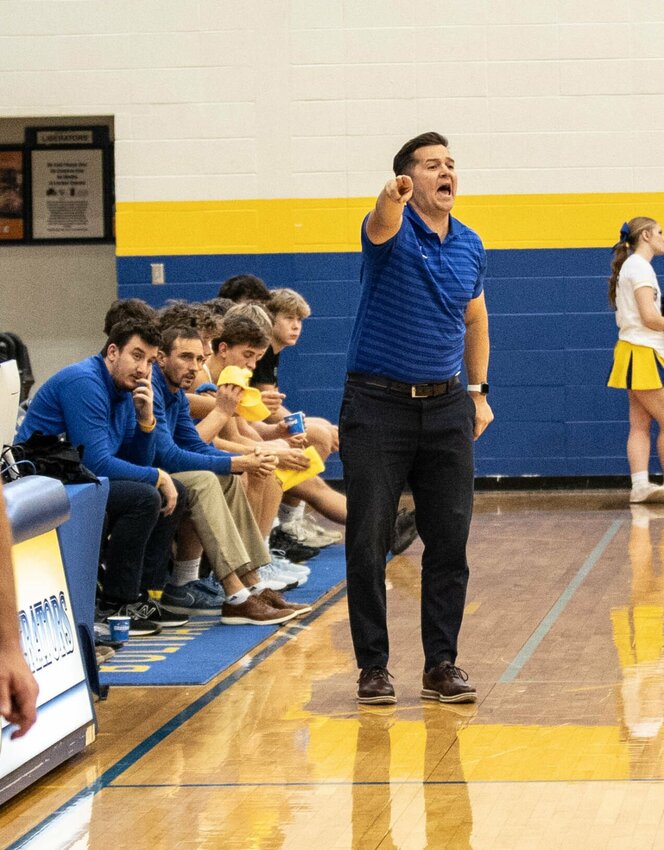 Coach Robby Hoegh directed his Liberators to his 300th win. Son of a Hall of Fame Iowa high school coach, he is carrying on the tradition very well.   STAFF PHOTOS/BOB CAMPBELL