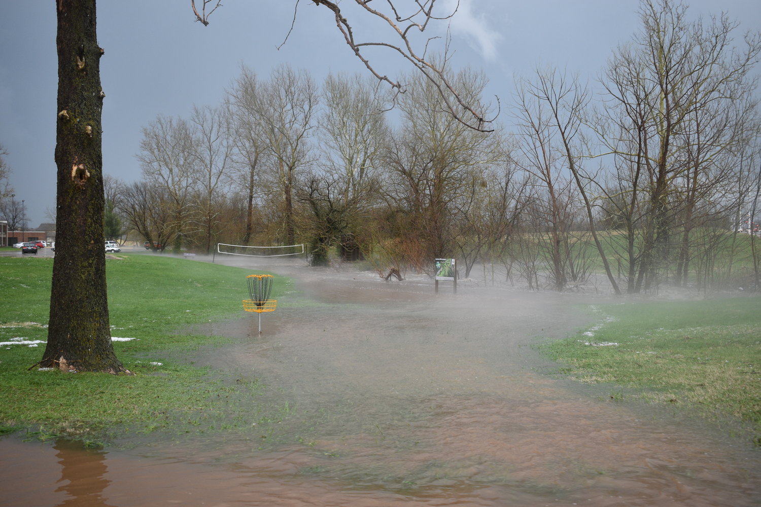 A river runs through SBU’s campus following heavy rain Thursday.