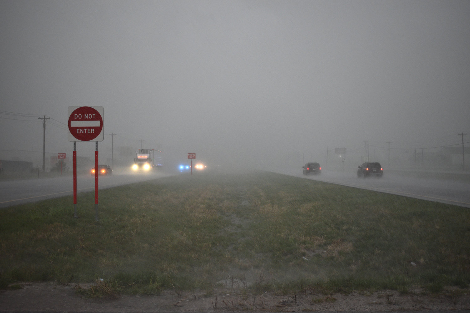 Looking north on Mo. 13, south of Bolivar, there appears to be a thick fog as significant hail drops from the sky.