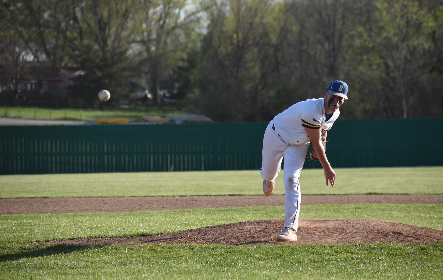 Pitcher Cooper Cribbs delivers a ball to the plate.