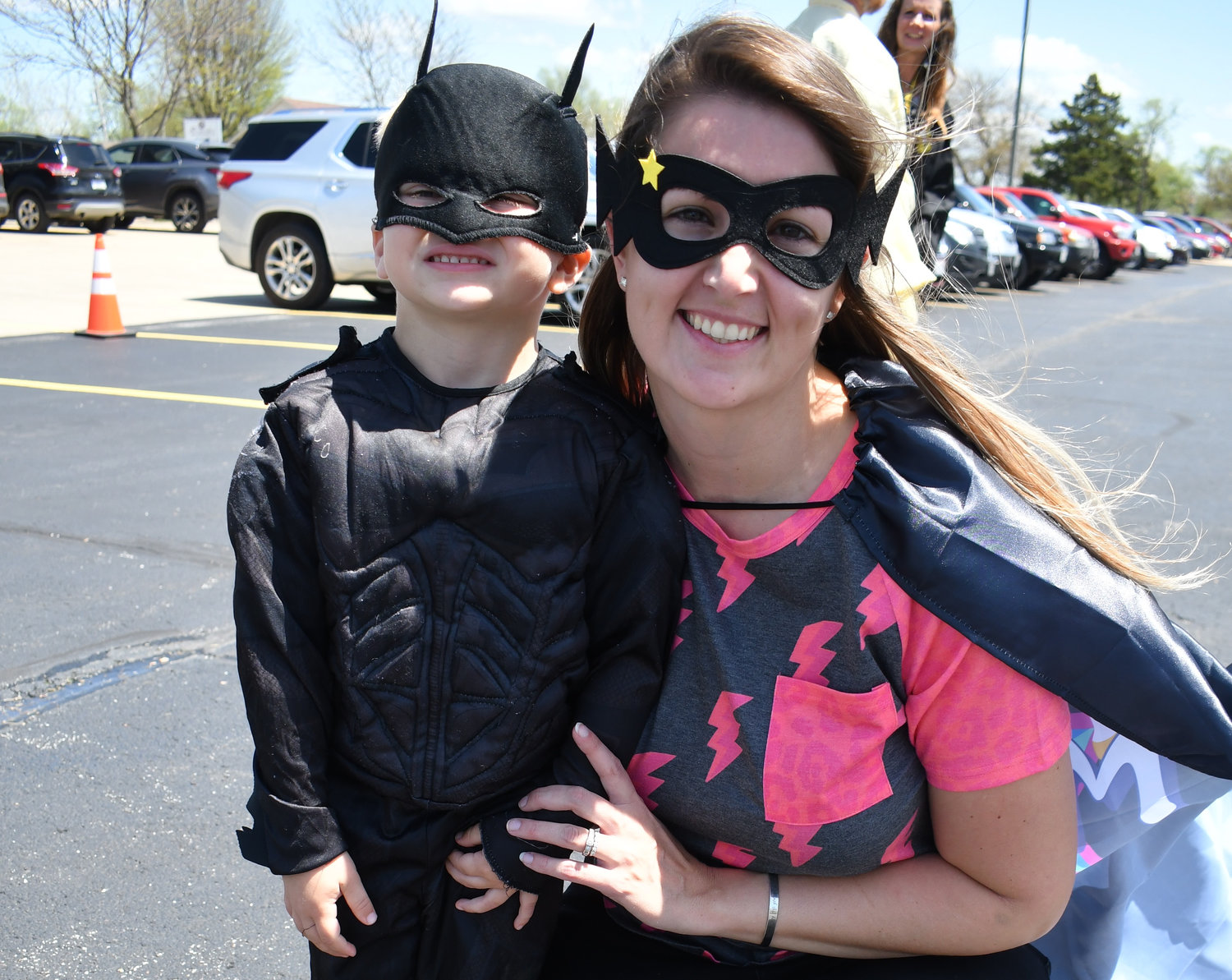 Batman Ares DuBose and his Super Mom, Claudette DuBose, show off their inner superheroes at the event.