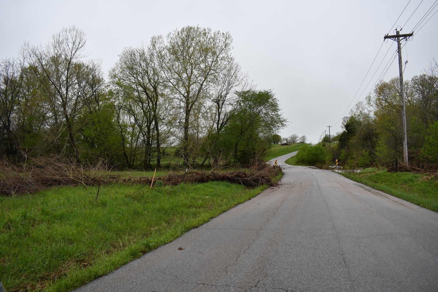 Water is still up to the bridge after having been over the road and washing a lot of debris into the ditch alongside the bridge on Mt. Gilead Road, just west of Silo Ridge Country Club.