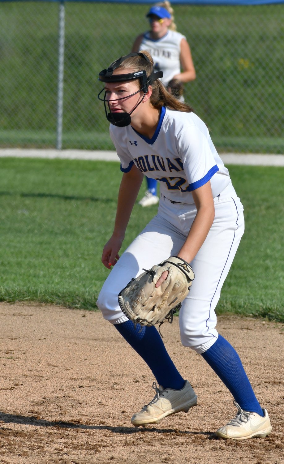 Harper Rowell keeps her eye on the batter to be ready to stop the ball.