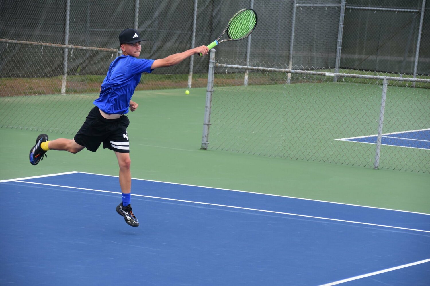 Havens soars through the air for a flying forehand.


STAFF PHOTO/AIDAN MAUCK
