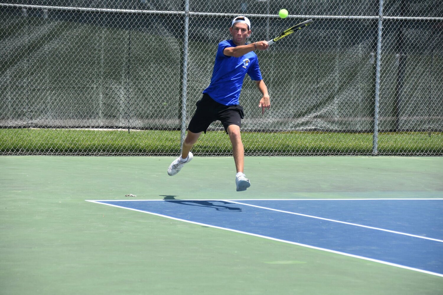 Tull fires a forehand down the line.


STAFF PHOTO/AIDAN MAUCK