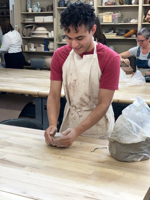 Alejandro Sierra works on a project during ceramics class.