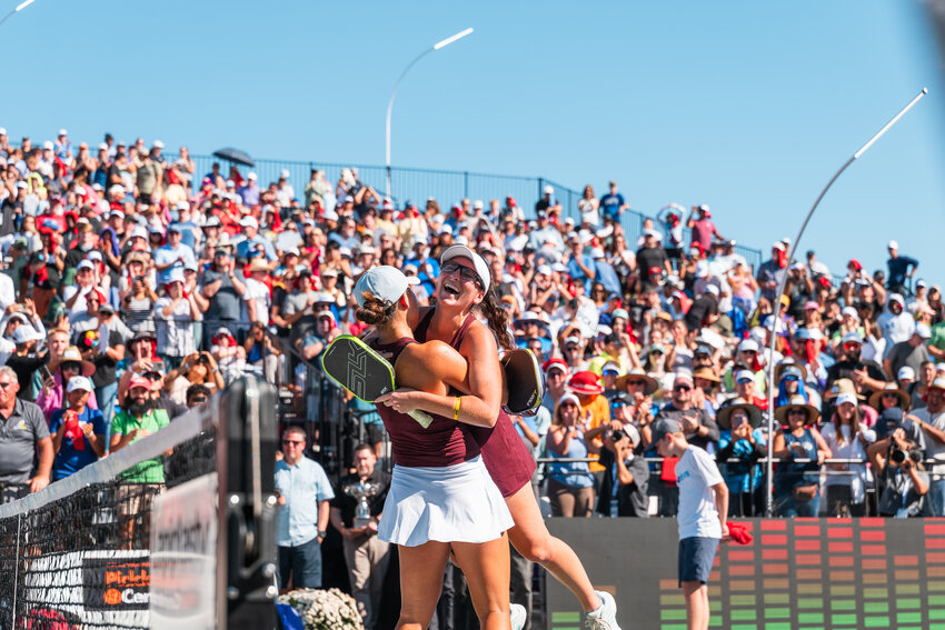 Rachel Rohrabacher and Anna Bright celebrate a sweep in Women’s Doubles.