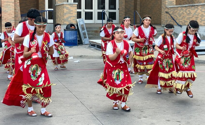 The Matachines from Mary Immaculate Catholic Church dance at the R.L. Turner World Culture Day. According to the Texas State Historical Association, Los Matachines is a traditional religious dance based on a Spanish ritual often performed with 12-18 performers.