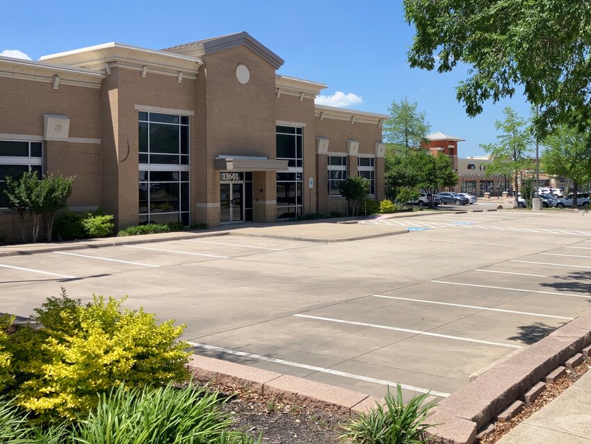 The bank building at Midway and Alpha roads could be razed to make way for a QuikTrip gas station and convenience store. Origin Bank vacated the building in February.