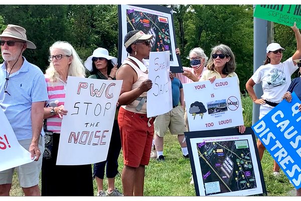 Prince William, Manassas and Fauquier residents gather outside the Amazon Data Center on Hastings Way in Manassas to protest data centers outside the overlay district.