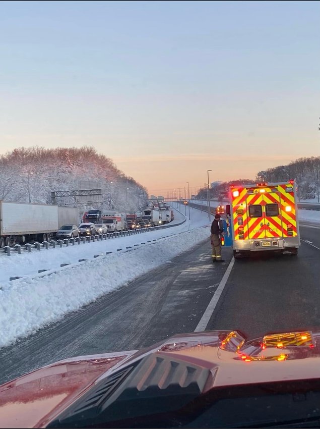 EMTs provide care to people who were stuck in their cars for long periods of time during the I-95 road shut-down. 