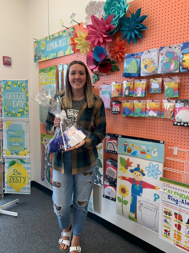 Haylee Foor shows her Teachables gift inside the educational supply store. 