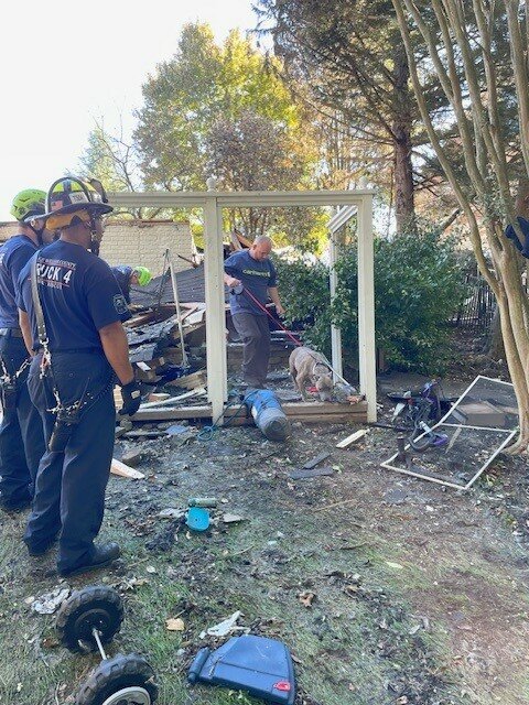 Prince William firefighters rescue family dog from the house of Colby Hunt Court that exploded on Oct. 15.