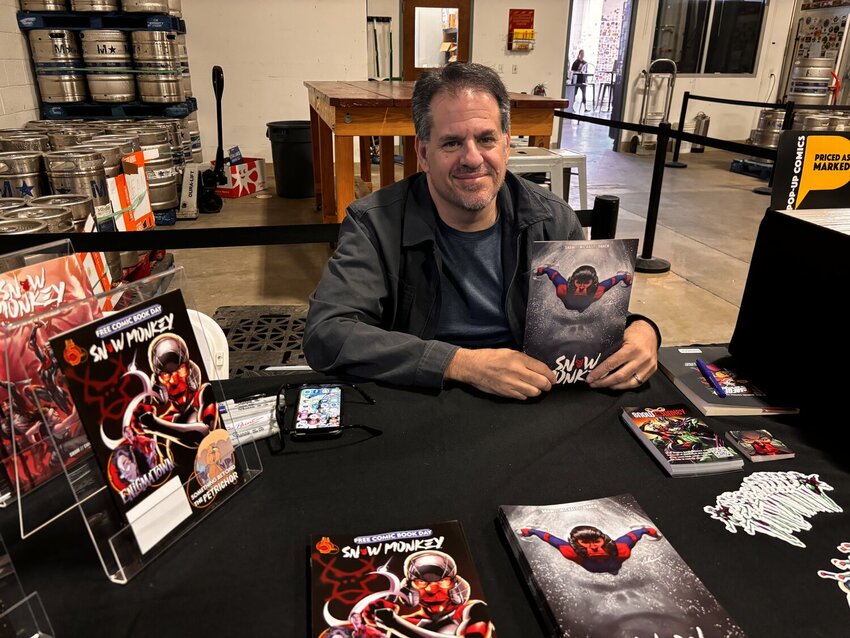 Comic writer Jason Shaw displays a preview of "Snow Monkey" issue 1, with the Aaron Bartling cover, and Red5's Free Comic Day edition, at Fair Winds Brewing Co., April 27.