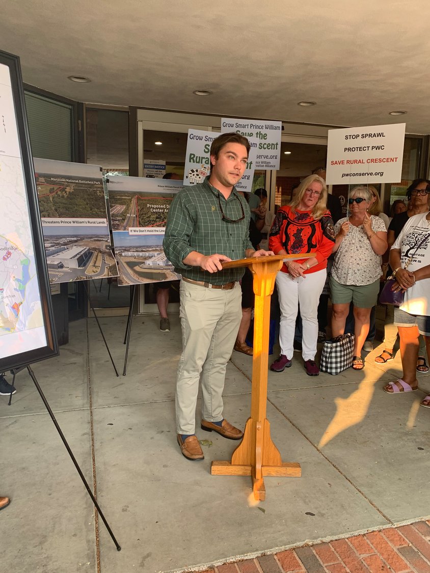 Kyle Hart, Mid-Atlantic Field Representative for National Parks Conservation Association, addresses the media at Prince William County government building.