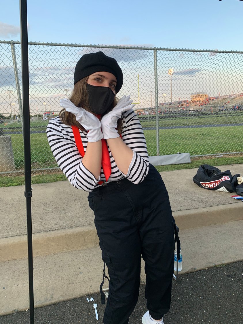 Members of 22 Patriot Clubs participated in the celebration. Here a girl from the French Honors performs as a mime. "Some of them are especially creative," said Leadership Development Teacher, and lead organizer of the event, Sharon Shipman.
