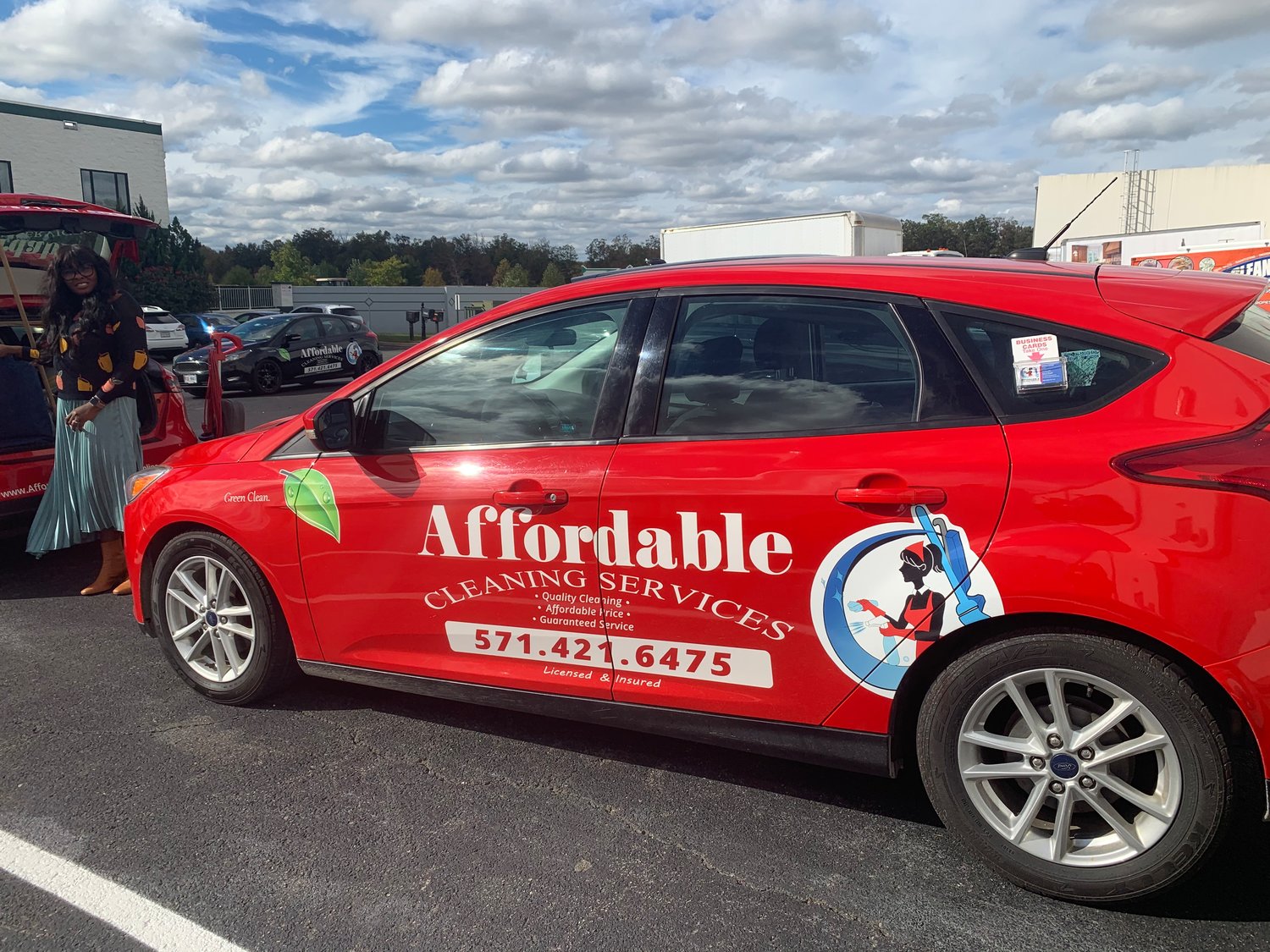 Affordable Cleaning Services is recognizable by the company's signature red cars displaying the ACS logo.