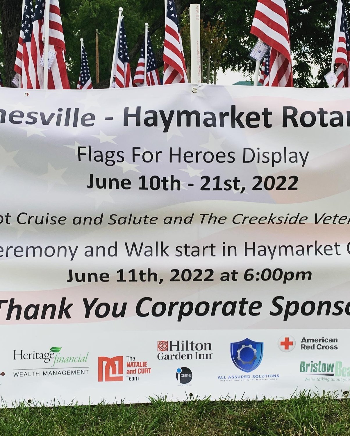 Signage recognizing premier sponsors of Flags for Heroes.