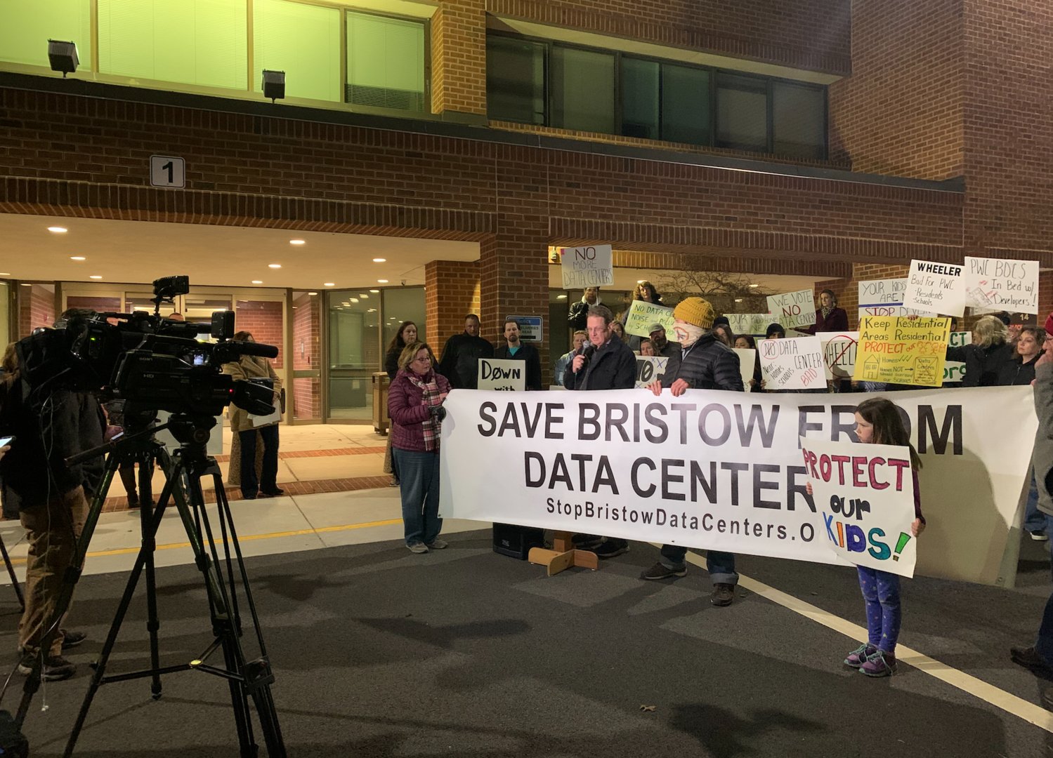 Bristow residents and allies hold a media conference on Feb. 7 to protest the proposal for the Devlin Technology Park data center.